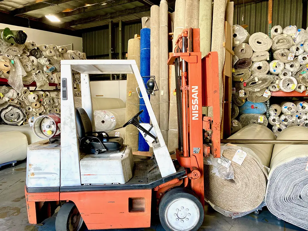 Fork Lift in Carpet Warehouse | Off Price Carpet & Flooring