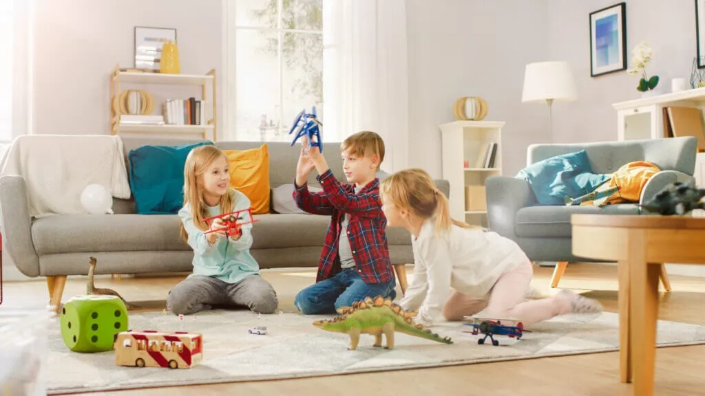 Kids playing in living room | Off-Price Carpet Outlet