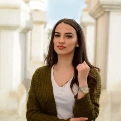 Lady wearing green jacket | Off-Price Carpet Outlet