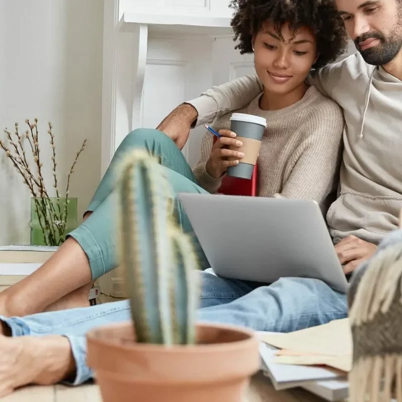 imgi_4_financing-square-square Couple looking into laptop | Off-Price Carpet Outlet